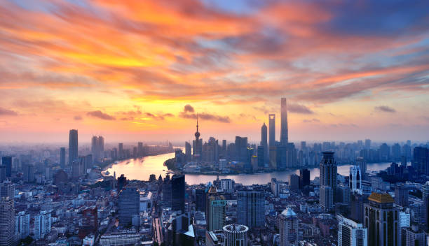 istock Shanghai Skyline in Dramatic Sky at Sunrise 690867944