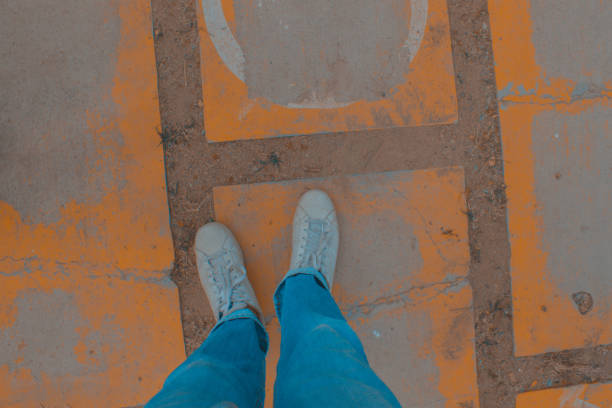 istock shoes on roads 690871606