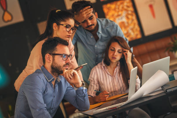 istock Group of casual business people working on new project 690878822