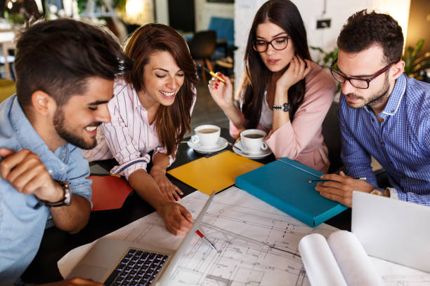 Group of casual business people working on new project