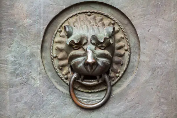 Old medieval doorknocker with lion haed seen in Nuremberg