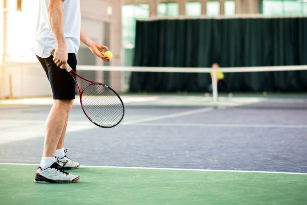 istock Skillful tennis player on playground 690880192