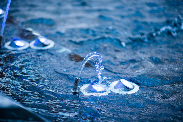 close up fountain water with low speed shutter. - well fountain water pipe pipe imagens e fotografias de stock