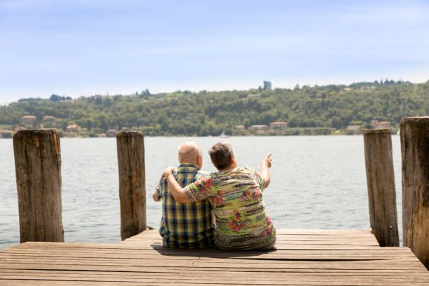 istock Senior couple on jetty 690882730