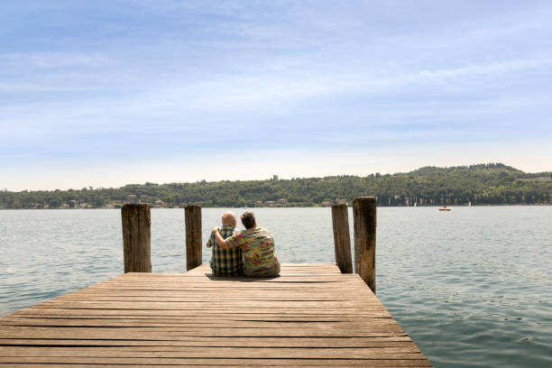 istock Senior couple on jetty 690882760