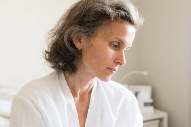 istock Middle aged woman in bedroom 690886348