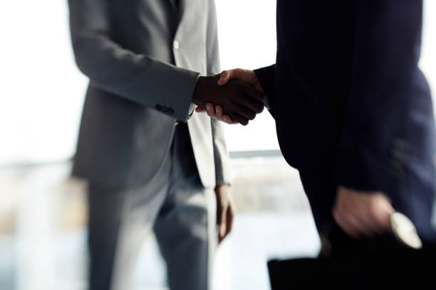 istock Strong Handshake of  Business People 690893194