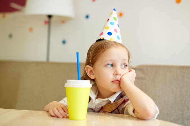 istock Girl at party 690893692
