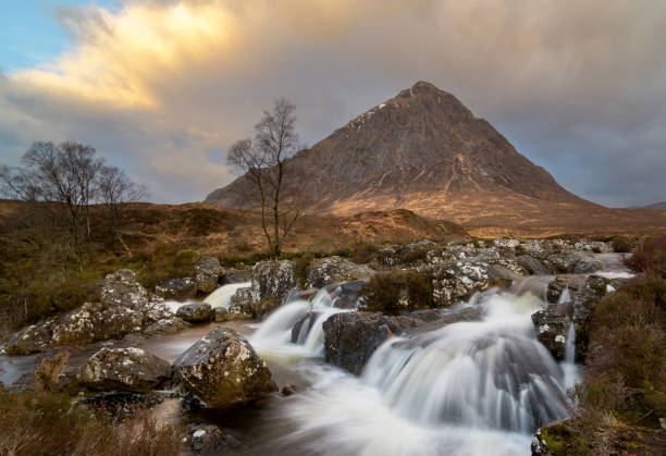 Buachaille Etive Mor, Scotland Coupall Falls and Buachaille Etive Mor in Scotland etive river photos stock pictures, royalty-free photos & images