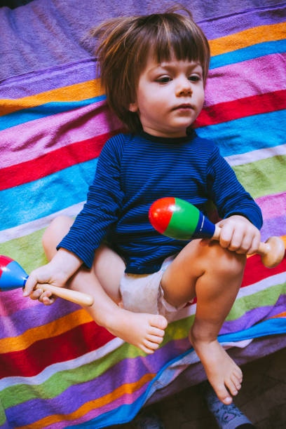istock Energetic Boy Partying In Bed 690904000