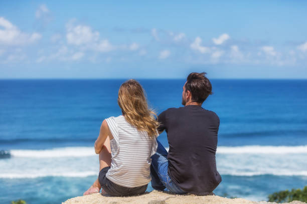istock Couple enjoying the view on a tropical beach. 690906962