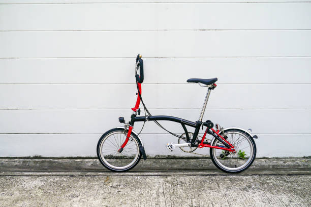 Black and red folding bicycle stock photo