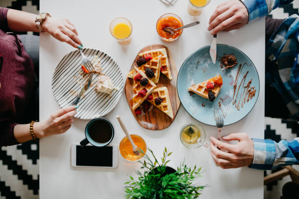 istock Couple eating a sweet dessert together 690962300