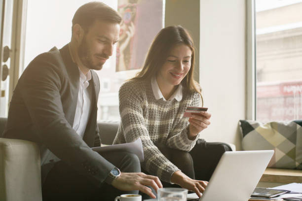 istock Business people. Modern business people working on laptop. 690964338