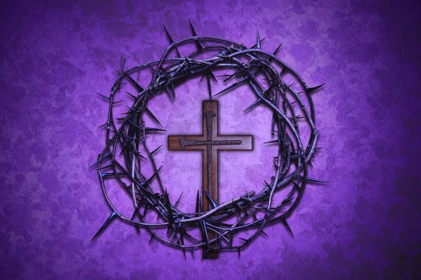 Crown of Thorns with Cross on purple background.