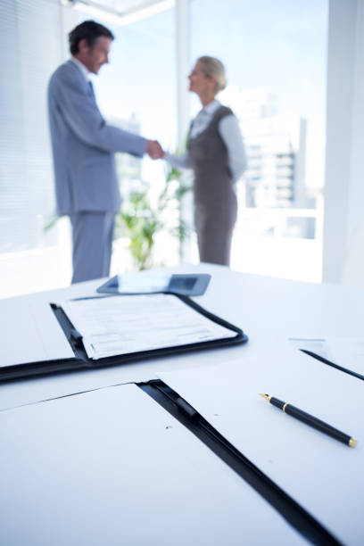 istock Business partners shaking hand together 691095284