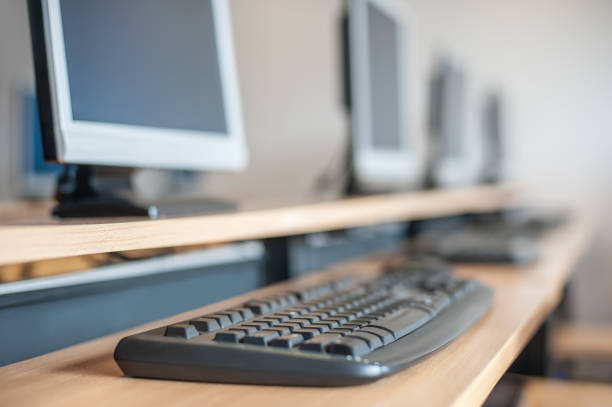 istock Photo of row computers in classroom or other educational institution 691118470