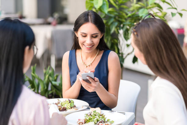 istock Happy lady watching at phone in cafe 691119568