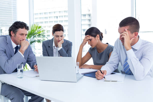 istock Concentrated business people in discussion in an office 691126192