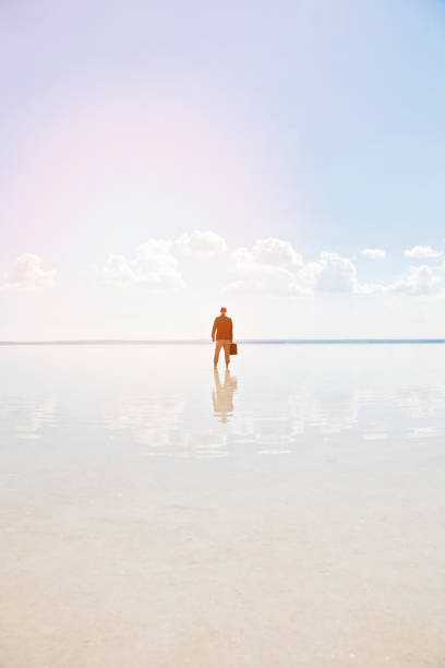 istock Businessman on salt lake 691173484