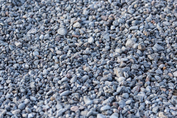 istock Crushed stone on the road as a background 691174794