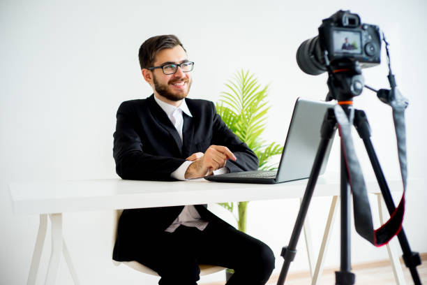 istock Male video blogger 691177840