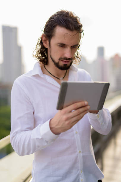 istock Handsome bearded man outdoors 691177860