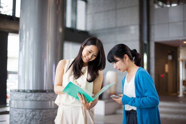 istock Quick Business discussion in the lobby 691178566