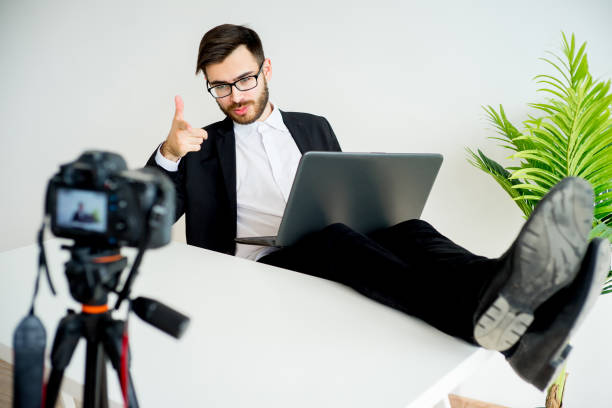 istock Male video blogger 691178596