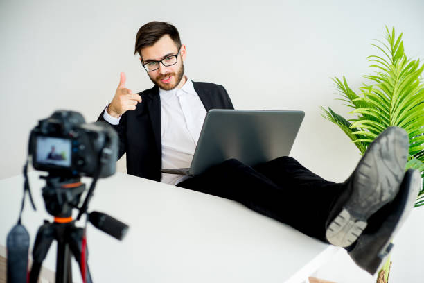 istock Male video blogger 691178640