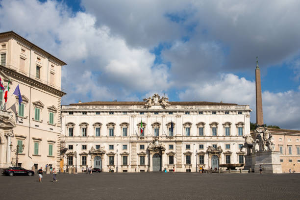 Quirinal Square in Rome, Italy ROME, ITALY - July 25, 2015:  The Piazza del Quirinale sits atop Quirinal Hill, the highest of the Seven Hills of Rome.  It contains Quirinal Palace which is home to Italy's president, the Palazzo della Consulta, and an obelisk with large statues of Castor and Pollux at its base. quirinal palace stock pictures, royalty-free photos & images