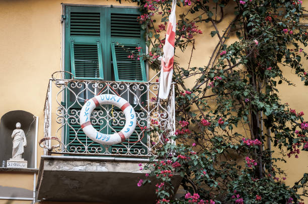 VERNAZZA, ITALY - DECEMBER 2016: Traditional Italian balcony decorated with rescue circle