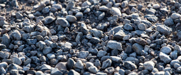 istock Crushed stone on the road as a background 691195376