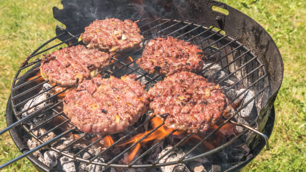 istock Hamburgers on the Grill 691195832