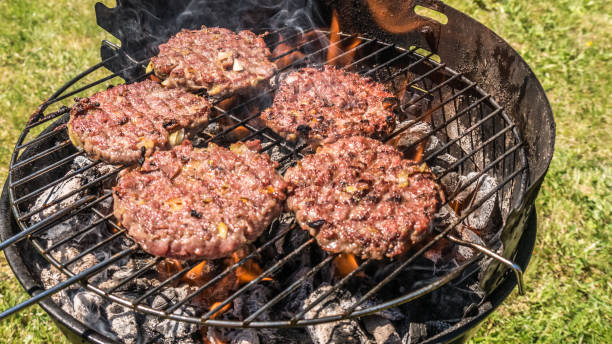 istock Hamburgers on the Grill 691195962