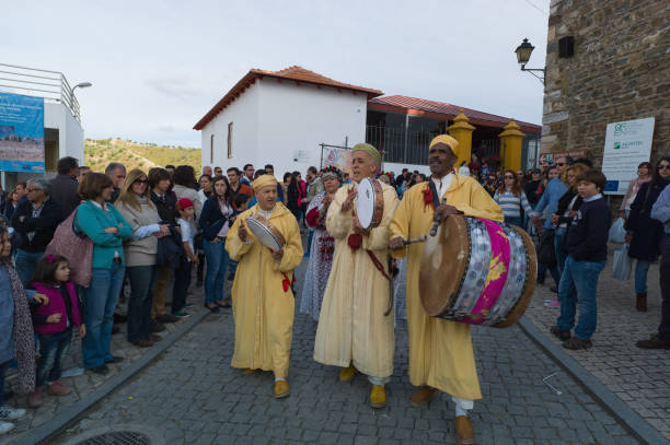 Mértola, Portugal - May 19, 2013: Tradicional folklore berber musicians play in a street of the portuguese village of Mértola in the Alentejo district, during a islamic festival.