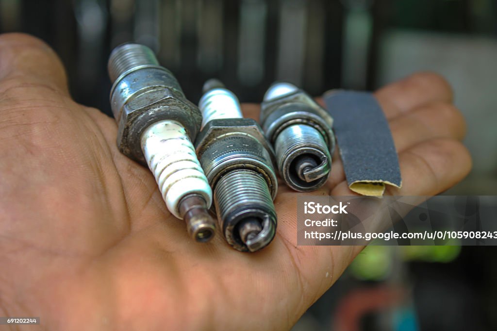 Clean the spark plug Car Stock Photo