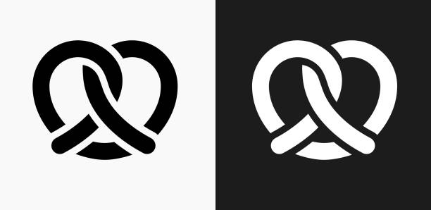 Pretzel Icon on Black and White Vector Backgrounds Pretzel Icon on Black and White Vector Backgrounds. This vector illustration includes two variations of the icon one in black on a light background on the left and another version in white on a dark background positioned on the right. The vector icon is simple yet elegant and can be used in a variety of ways including website or mobile application icon. This royalty free image is 100% vector based and all design elements can be scaled to any size. pretzel stock illustrations