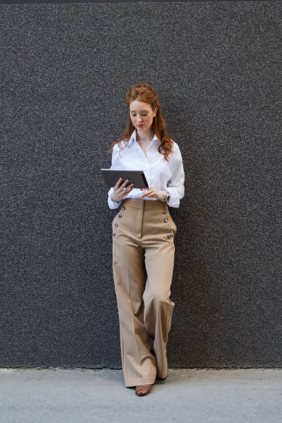istock Businesswoman with digital tablet 691211408