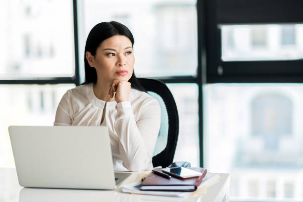 istock Serious confident lady concentrating on her thoughts 691217470