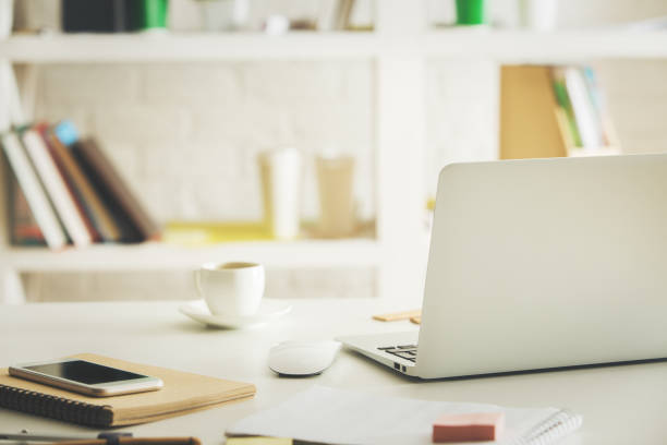 istock Desk with devices and supplies 691217810