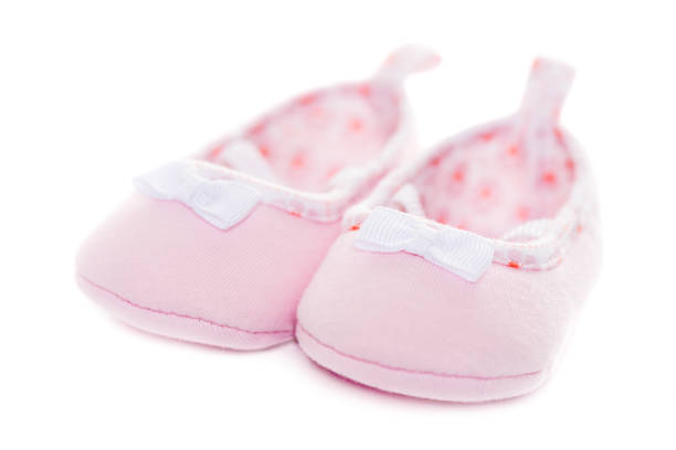 istock Close up pink baby shoes 691217966