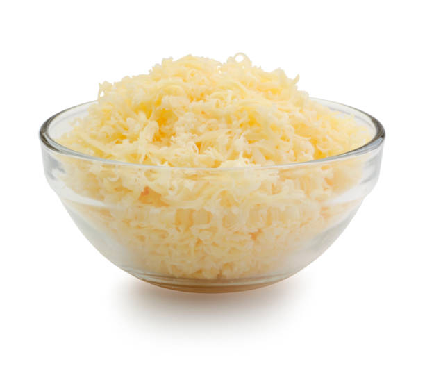 istock Grated cheese in a glass bowl isolated 691218614