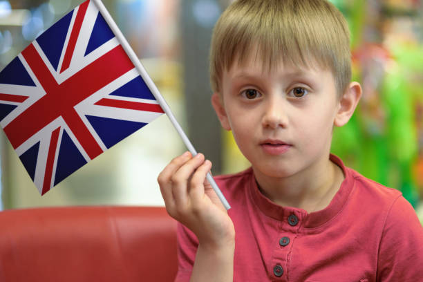 istock Boy with the UK flag 691218634