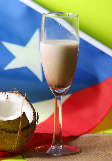 Glass of Puerto Rico Coconut Liquor with a national flag like background