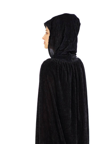 istock Profile widow in black hood and cloak isolated on white 691225116