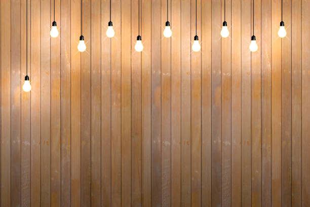 istock wood wall with bulb lights lamp. 691225254