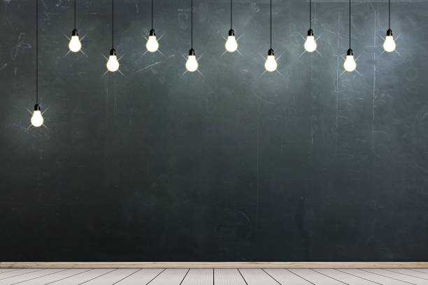 istock Empty room with chalkboard with bulb lights lamp. 691225322