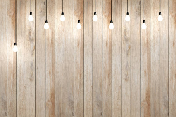 istock wood wall with bulb lights lamp. 691225584