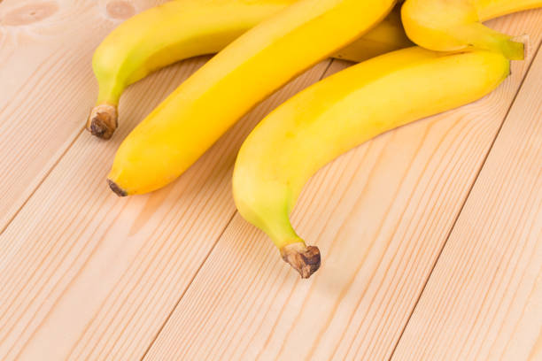 istock Banana on the wooden floor. 691228340